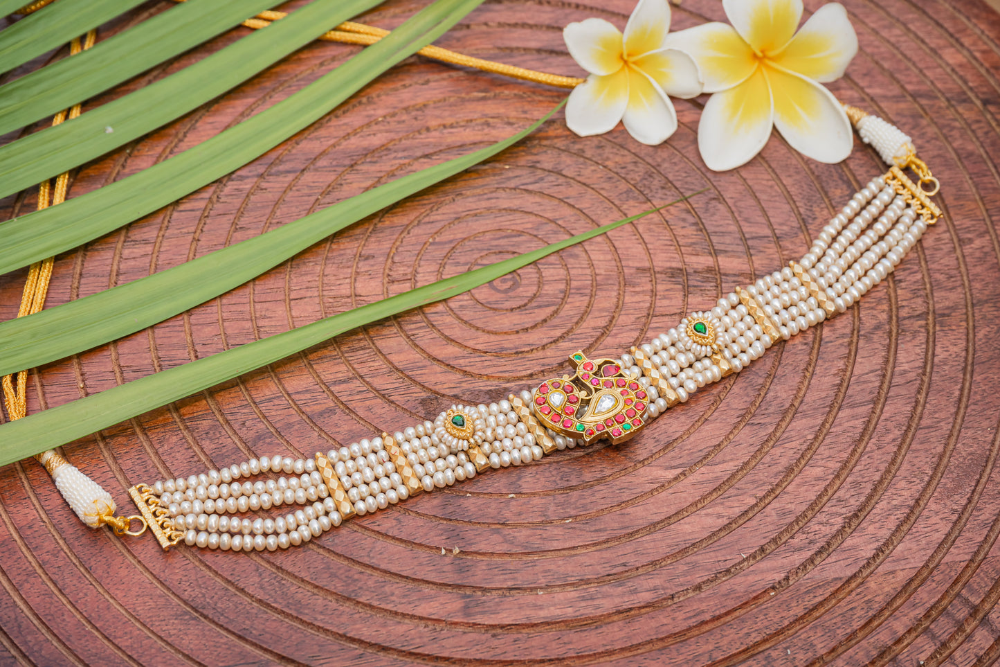 JADAU ON SILVER, PEACOCK MOTIF STRUNG IN PEARLS