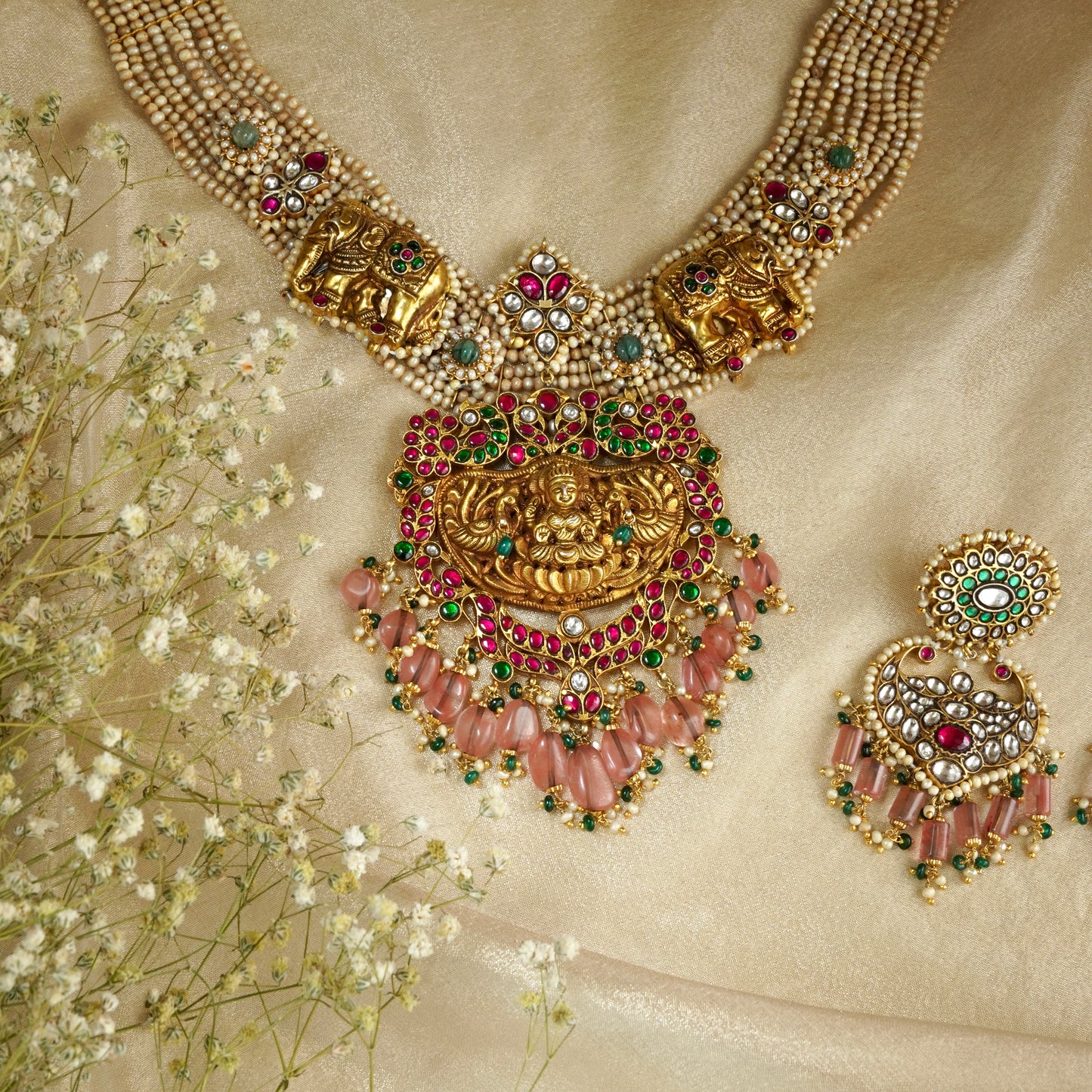 ORN038 Gold Plated 92.5 Silver Laxmiji Pendant with Gaj fastened on precious fresh-water pearls