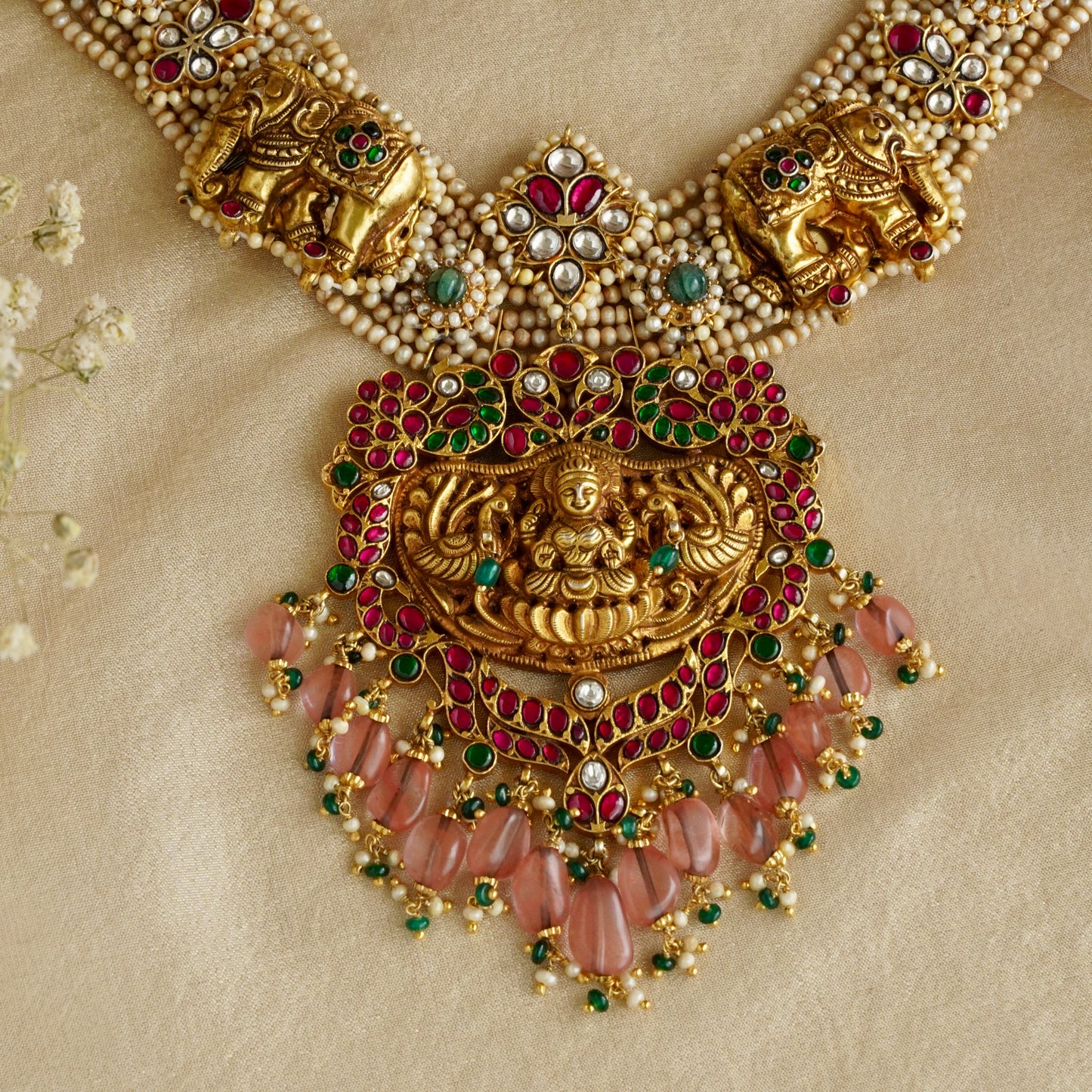 ORN038 Gold Plated 92.5 Silver Laxmiji Pendant with Gaj fastened on precious fresh-water pearls