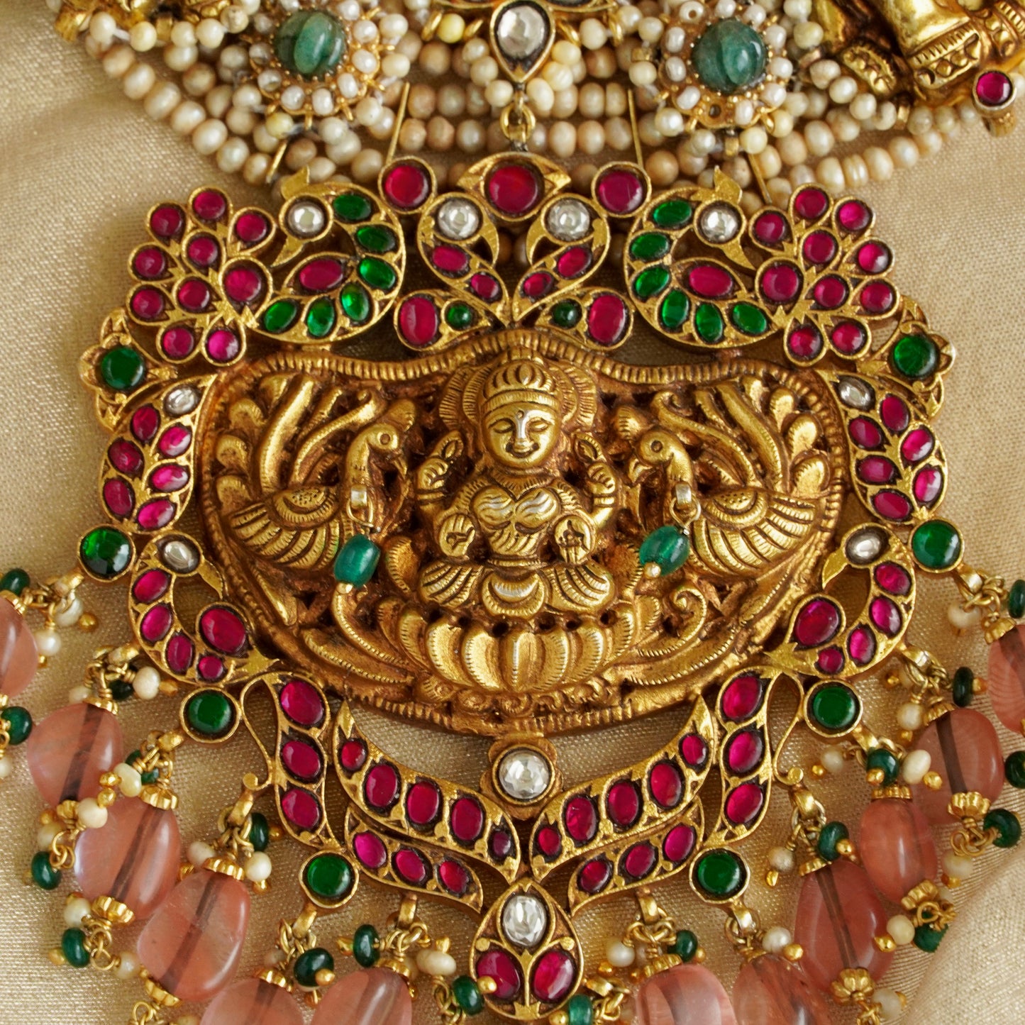 ORN038 Gold Plated 92.5 Silver Laxmiji Pendant with Gaj fastened on precious fresh-water pearls