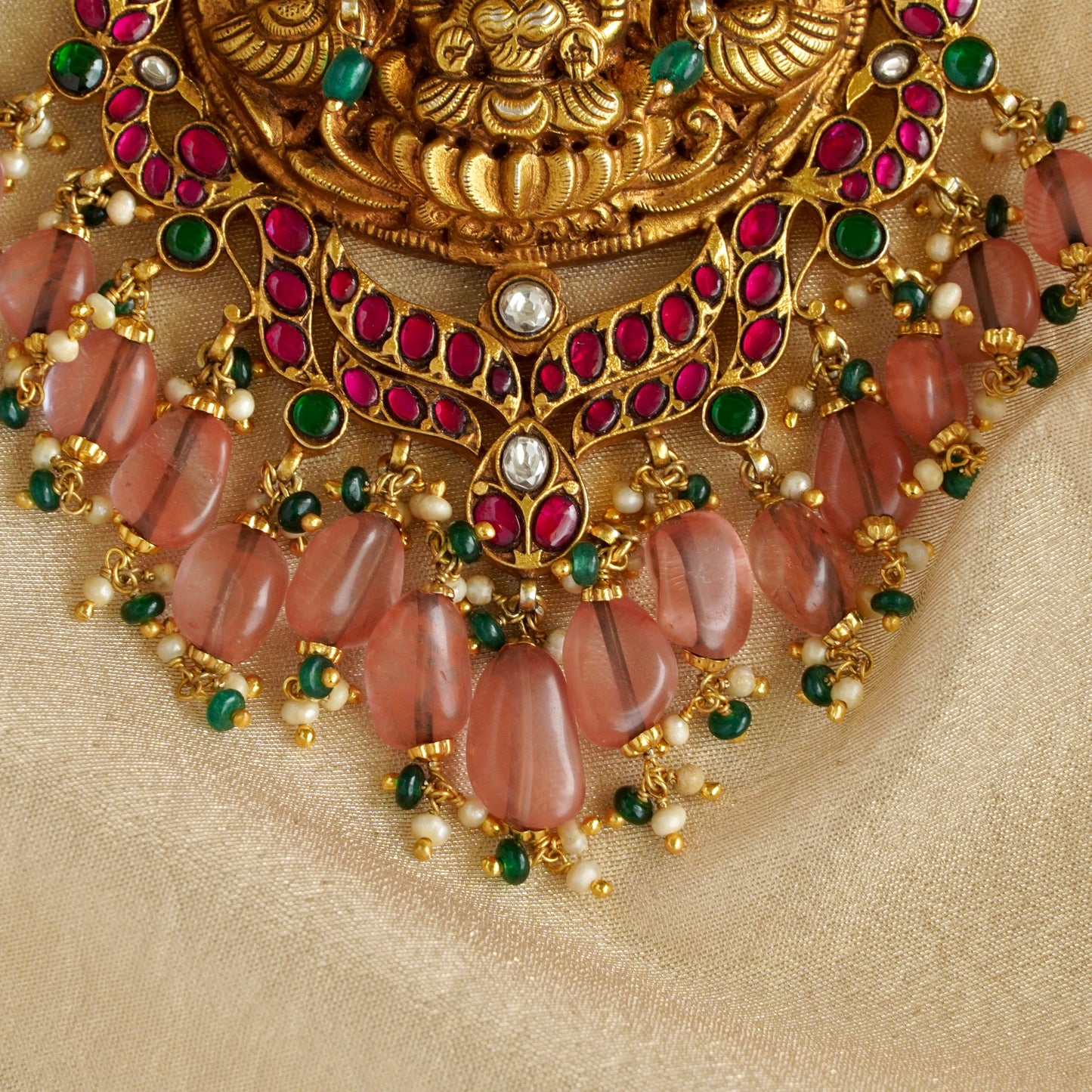 ORN038 Gold Plated 92.5 Silver Laxmiji Pendant with Gaj fastened on precious fresh-water pearls