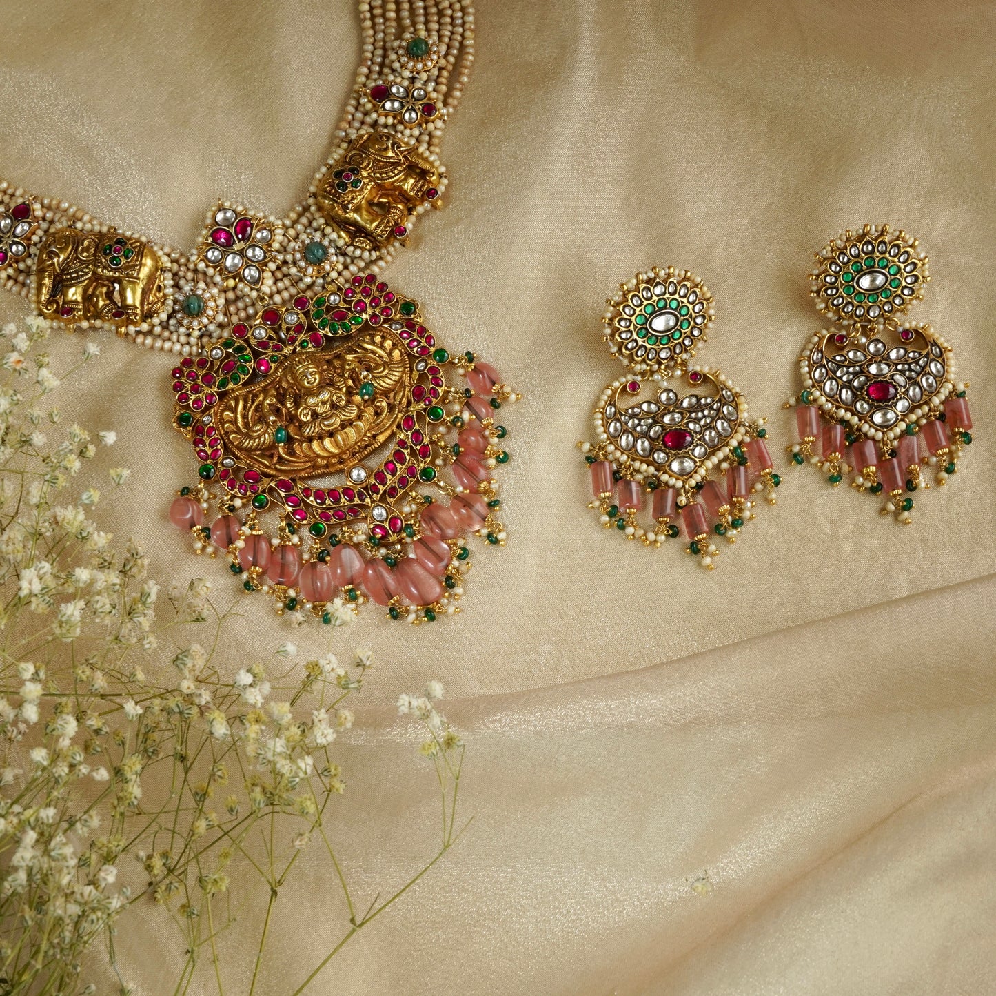 ORN038 Gold Plated 92.5 Silver Laxmiji Pendant with Gaj fastened on precious fresh-water pearls