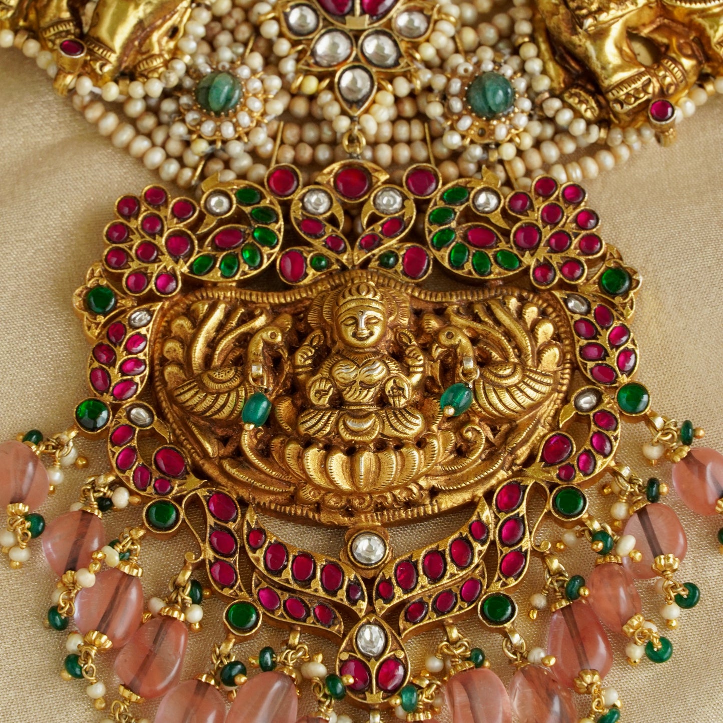 ORN038 Gold Plated 92.5 Silver Laxmiji Pendant with Gaj fastened on precious fresh-water pearls