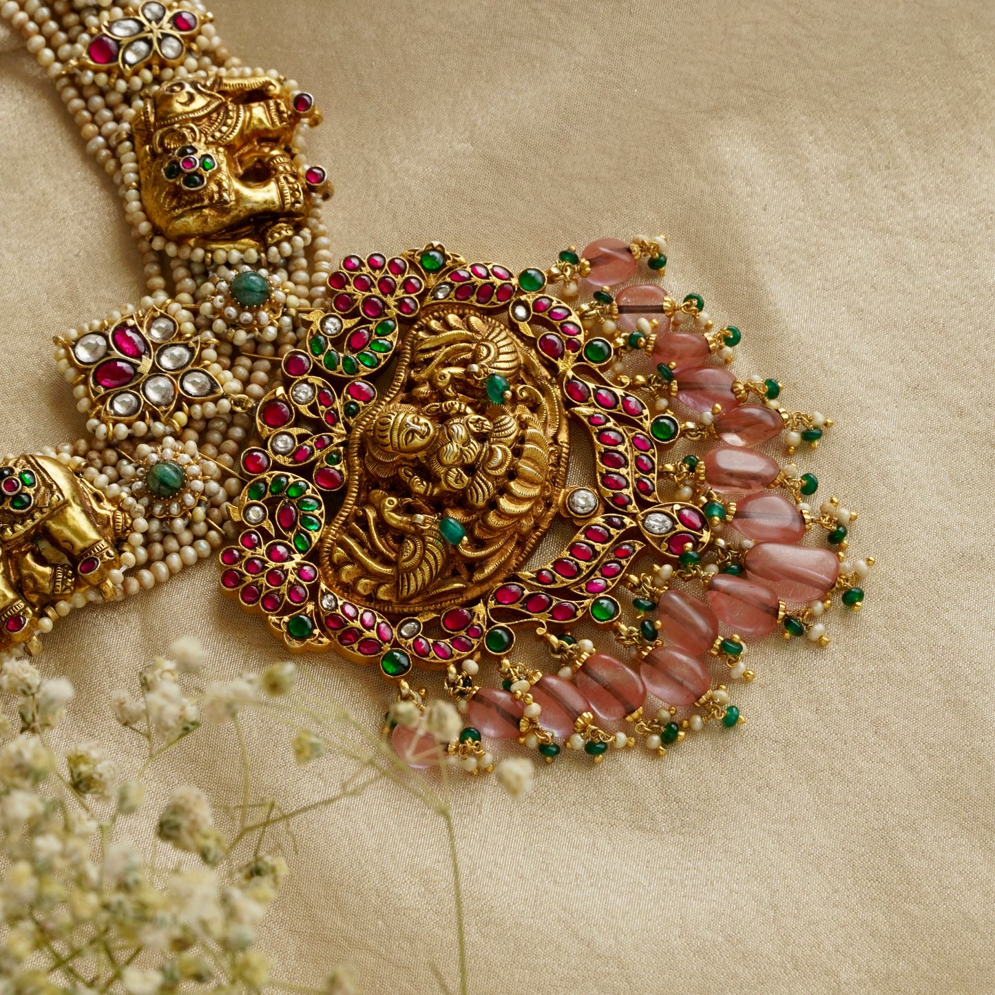 ORN038 Gold Plated 92.5 Silver Laxmiji Pendant with Gaj fastened on precious fresh-water pearls