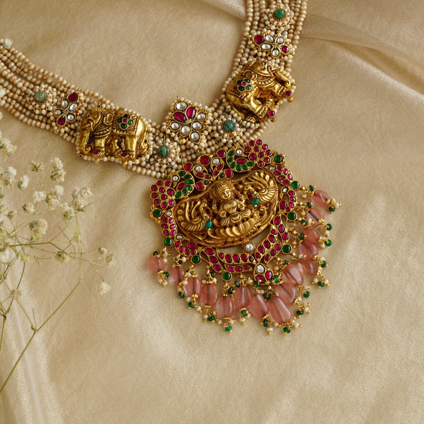 ORN038 Gold Plated 92.5 Silver Laxmiji Pendant with Gaj fastened on precious fresh-water pearls