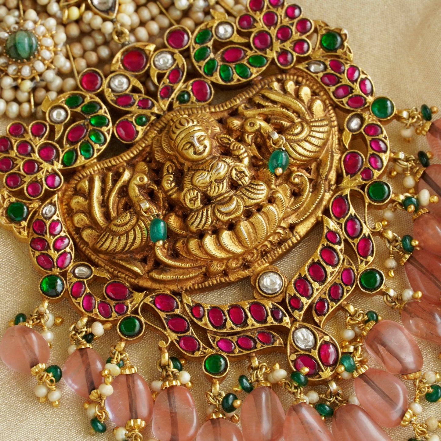 ORN038 Gold Plated 92.5 Silver Laxmiji Pendant with Gaj fastened on precious fresh-water pearls