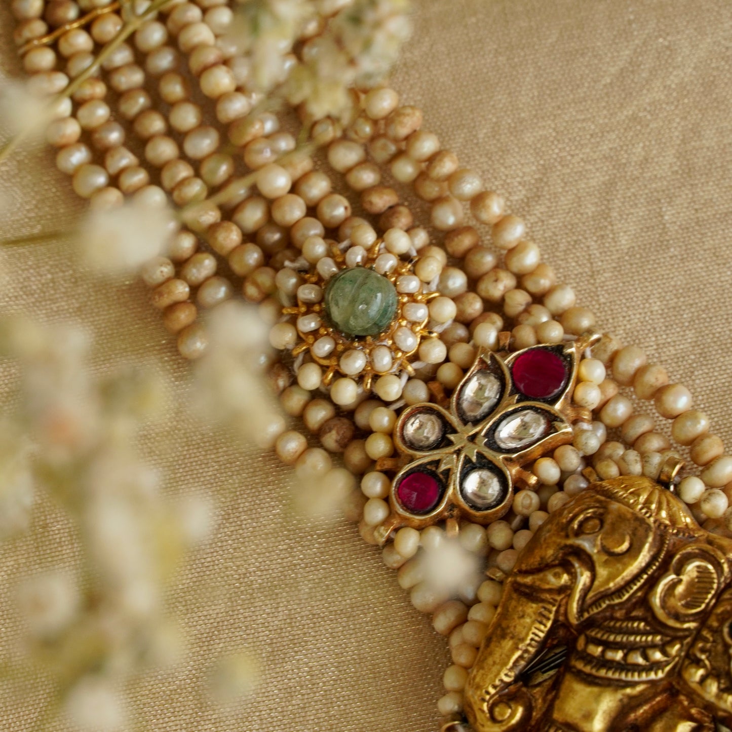 ORN038 Gold Plated 92.5 Silver Laxmiji Pendant with Gaj fastened on precious fresh-water pearls