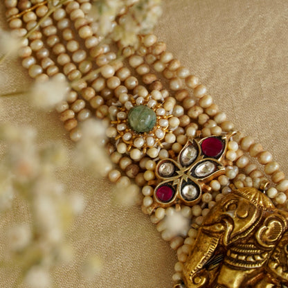 Laxmiji Pendant with Gaj fastened on precious fresh-water pearls