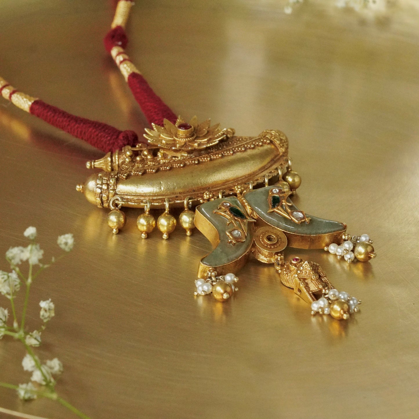 ORN062 Gold Plated 92.5 Silver sun Amulate with green gemstone tusks Pendant