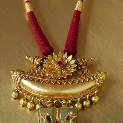 Sun Amulate with green gemstone tusks Pendant