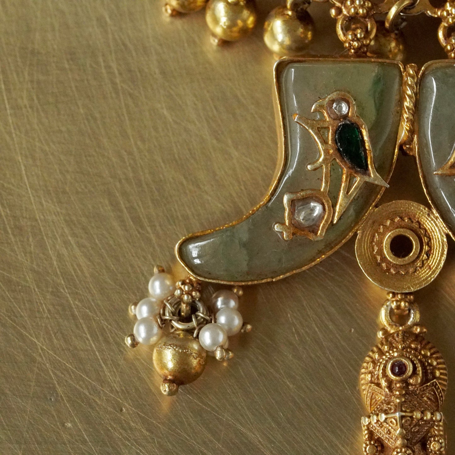 ORN062 Gold Plated 92.5 Silver sun Amulate with green gemstone tusks Pendant