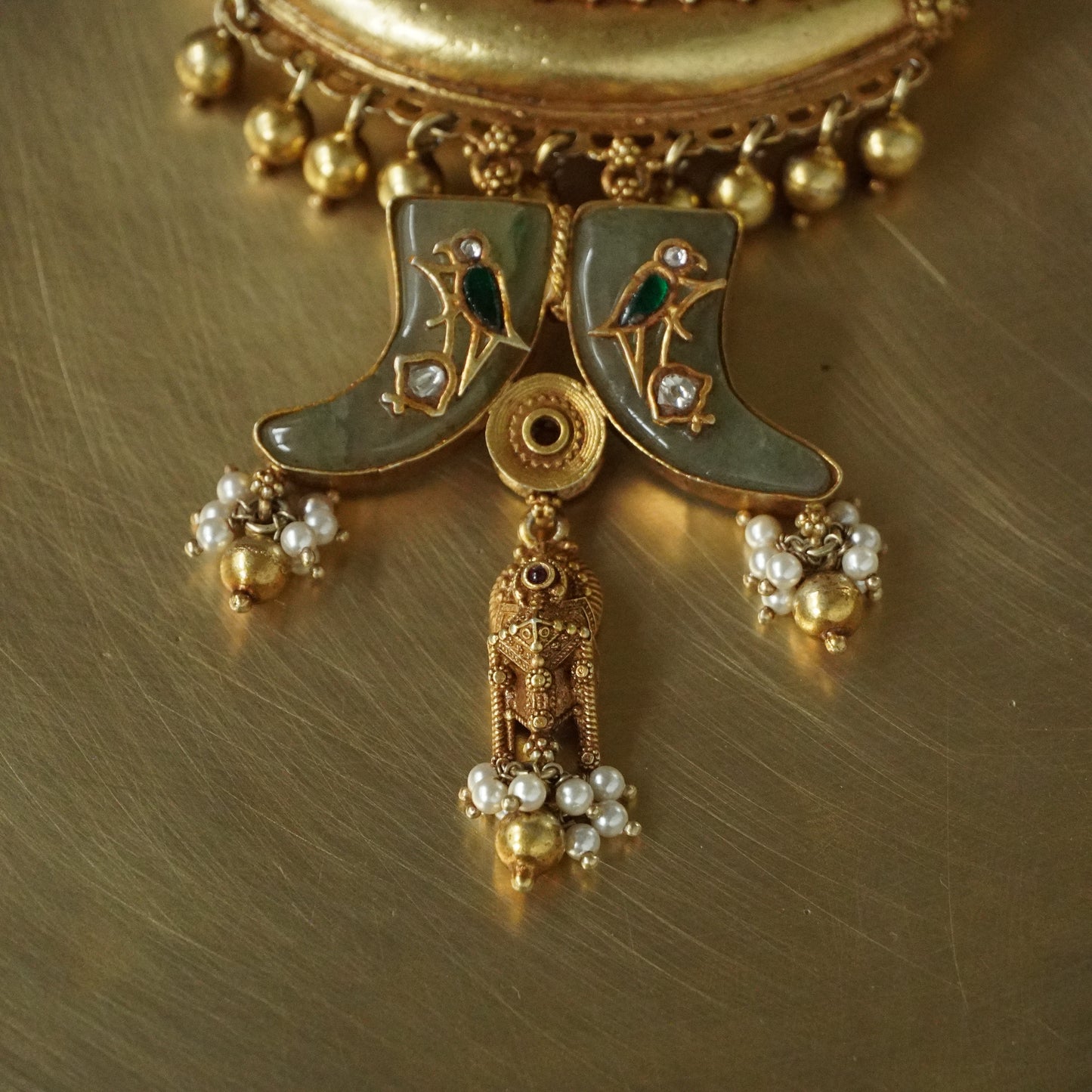 ORN062 Gold Plated 92.5 Silver sun Amulate with green gemstone tusks Pendant