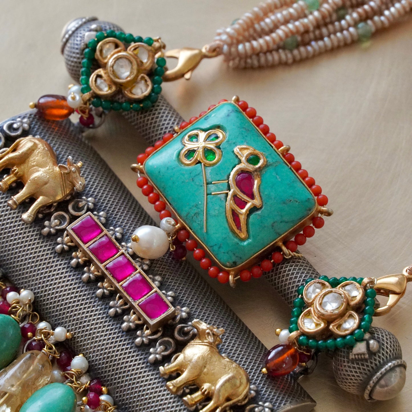 ORN078 Dual Tone 92.5 Silver Firoza gemstone on Amulate over a Nagada piece fastened in fresh-water precious pearls and earrings